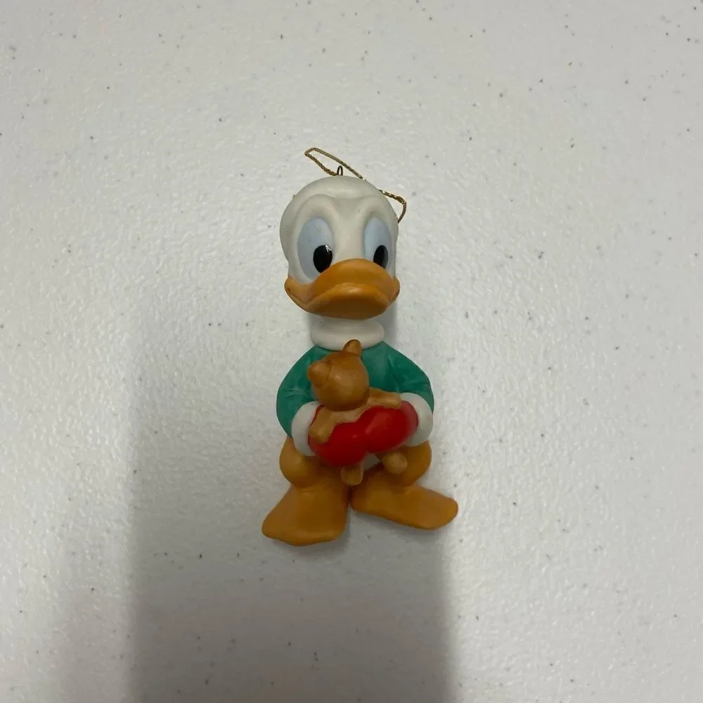 Disney Donal duck Santa holding teddy bear porcelain ornament